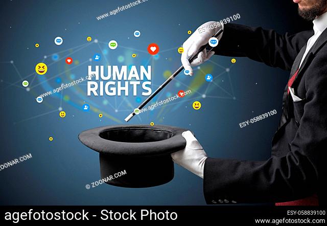 Magician is showing magic trick with HUMAN RIGHTS inscription, social media marketing concept