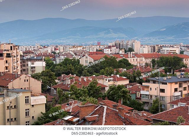 Bulgaria, Southern Mountains, Plovdiv, elevated central city view, dusk