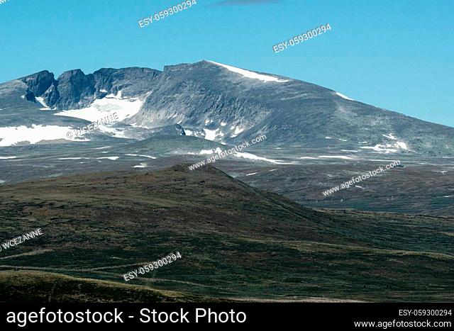 The Snéhetta is a mountain in the Dovrefjell region of Innlandet Province, Norway. At 2286 m, it is the highest mountain in Norway outside Jotunheimen