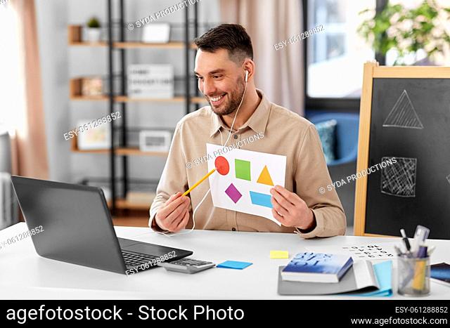 teacher showing shapes at online class at home