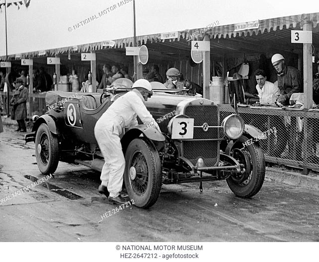 Studebaker of A Hollidge and GAW Laird in the pits at the JCC Double Twelve Race, Brooklands, 1929. Artist: Bill Brunell
