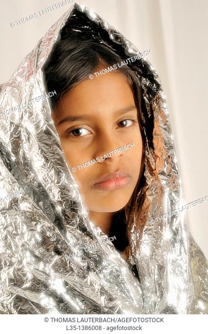 11 year old Indian girl wrapped in silver foil looks like a Maddonna, Stock  Photo, Picture And Rights Managed Image. Pic. L35-1386008 | agefotostock
