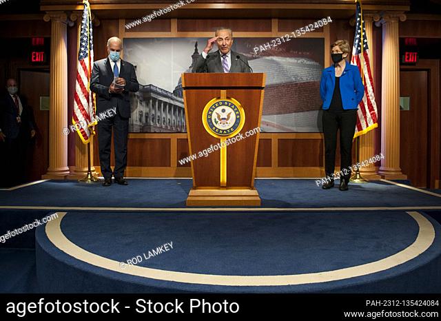 United States Senate Minority Leader Chuck Schumer (Democrat of New York), center, fields questions from reporters at the US Capitol in Washington, DC