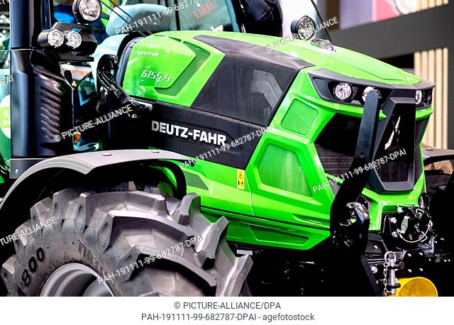 11 November 2019, Lower Saxony, Hanover: A tractor of the type ""Agrotron 6155.4"" stands at the Deutz-Fahr stand at the Agritechnica agricultural technology...