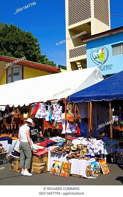 Puerto Corinto, Chinandega, Nicaragua, Central America, Shopper in outdoor craft market