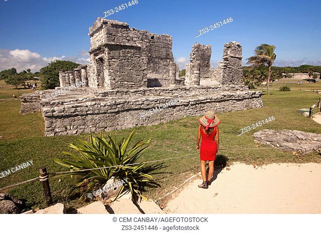 Tourists in Mayan Ruins at Maya archeological site of Tulum, Quintana Roo, Yucatan Province, Mexico, Central America