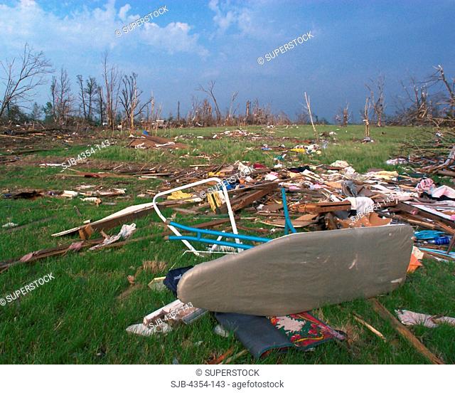 An Ironing Board Sites Among Debris and Destroyed Trees