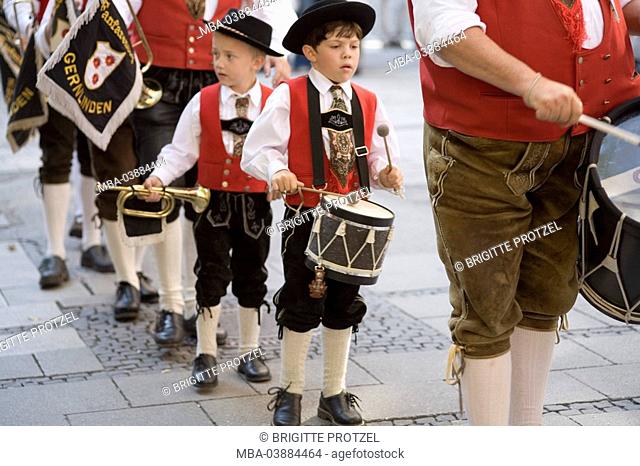 Germany, Bavaria, traditional costum-move, musicians, adults, children