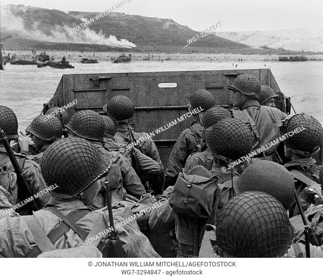 FRANCE Normandy -- 06 Jun 1944 -- Invasion. . . American assault troops move onto a beach in Normandy, France, on D-Day during Operation Overlord