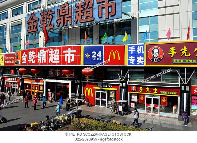 China, Beijing, fast foods in front of the train station in Chongwen...