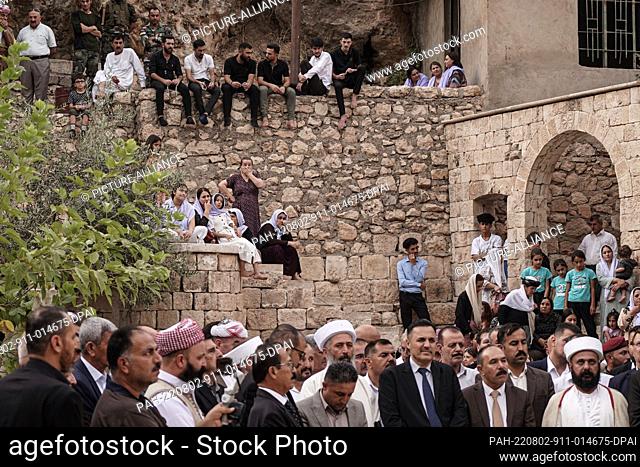 02 August 2022, Iraq, Lalish: Yazidis take part in an event at Lalish temple to mark the eighth anniversary of the Yazidi genocide carried out by the Islamic...