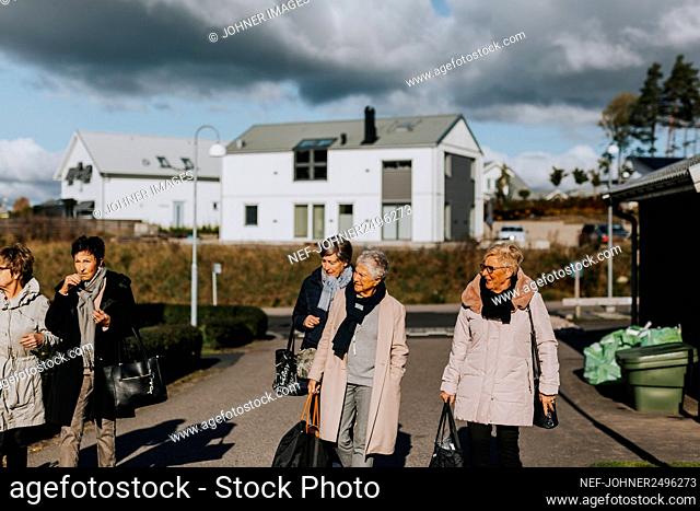Senior women walking together