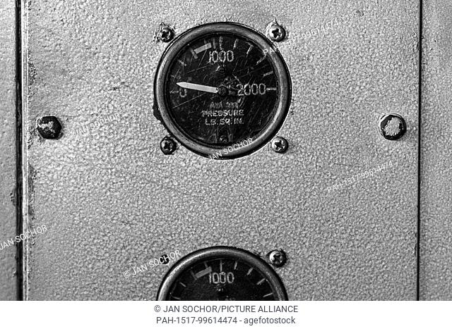 Hydraulic pressure indicators are seen in the cabin of a Douglas DC-3 aircraft during a routine maintenance check at the airport of Villavicencio, Colombia
