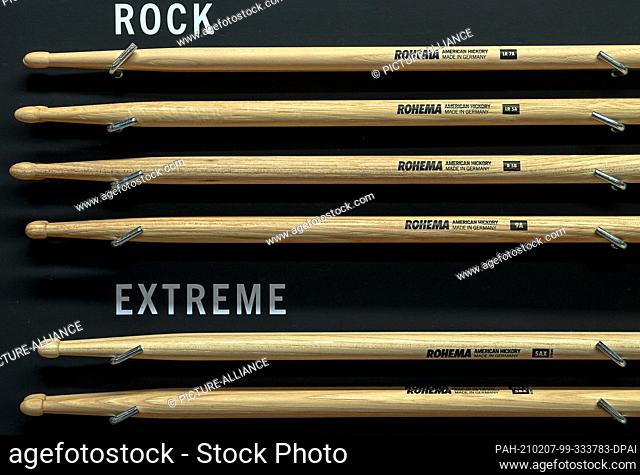 28 January 2021, Saxony, Markneukirchen: A selection of drumsticks from the Rohema Percussion range will be on display in the company's show room in...