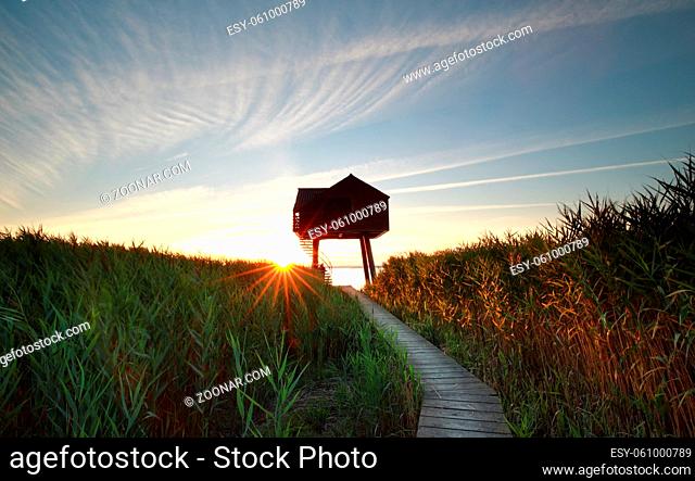 sunset behind wooden observation tower, Groningen, Netherlands