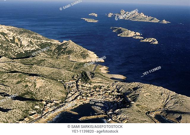 Coastal village of Goudes, with Jarre and Riou islands in the distance, Marseille, France