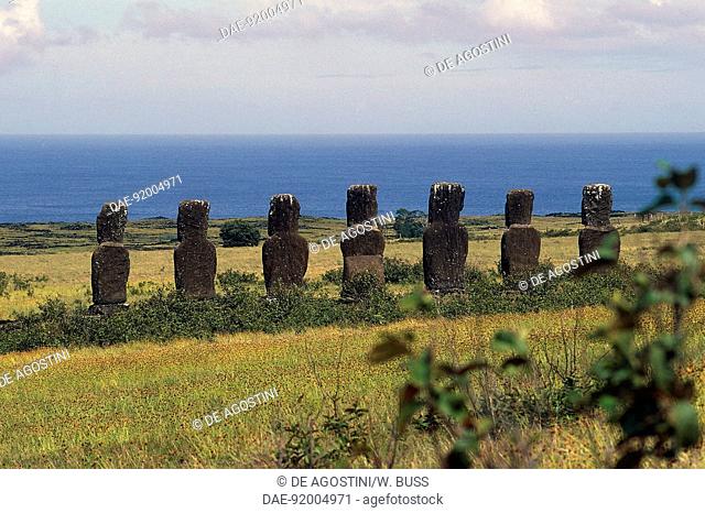 Moais, megalithic anthropomorphic statues, facing the sea, Ahu Akivi, Rapa-Nui National Park (UNESCO World Heritage List, 1995), Easter Island, Chile