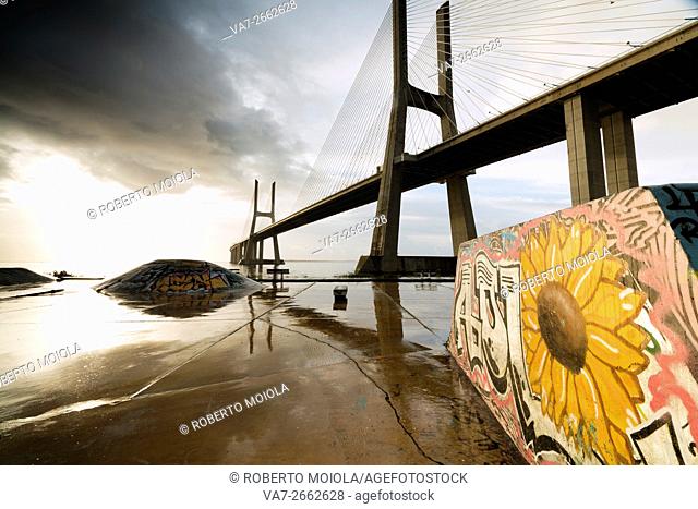 The colorful murals around Vasco Da Gama bridge emphasize its architecture and atmosphere at dawn Lisbon Portugal Europe