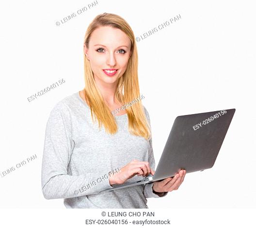 Caucasian young woman hold with laptop computer