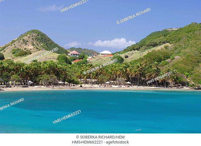 France, Guadeloupe French West Indies, Les Saintes, Terre de Haut, Pompierre bay, diver in the water and rocks in the distance