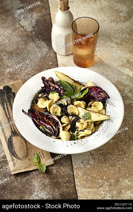 Orechiette with roasted radicchio and pear vegetables with olives