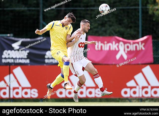 STVV's Ameen Al-Dakhil and Standard's Aleksandar Boljevic fight for the ball during a friendly soccer match between Belgian Jupiler Pro League team Standard de...