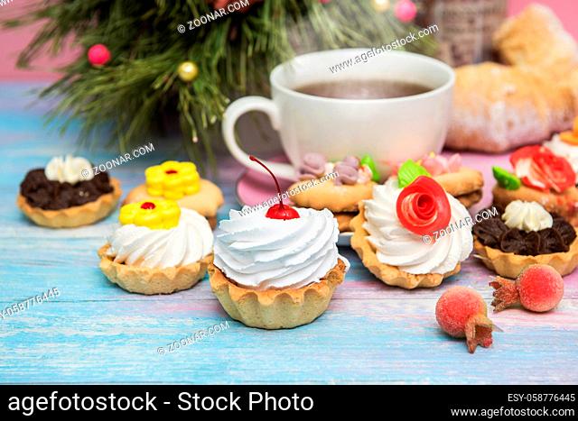 Tasty cookie on a fir-tree background for happy new year holiday