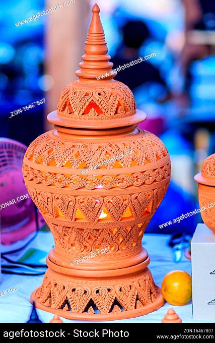 Beautiful handmade ceramic lamp in Thai's style patterns. Pottery Lamp with Thai style