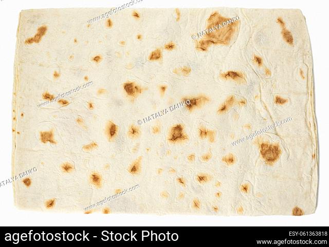 Baked twisted pita bread on a white isolated background