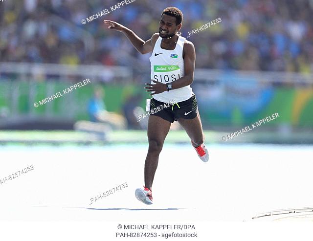 Rosefelo Siosi of Solomon Islands competes in Men's 5000m Round 1 heat of the Athletic, Track and Field events during the Rio 2016 Olympic Games at Olympic...