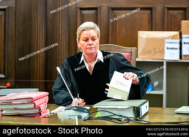 19 December 2023, Hamburg: The presiding judge at the district court, Jessica Koerner, sits in the courtroom before the start of the trial