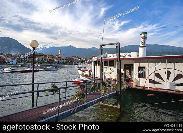 Townscape with ship restaurant on the lake promenade, Feriolo, Piedmont, Italy, Europe. View of Feriolo on Lake Maggiore