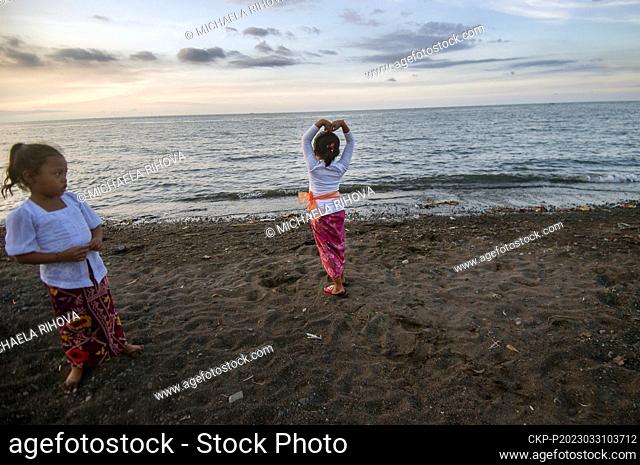 Children play on the beach during the Balinese New Year holiday Nyepi in the northern part of the island of Bali, March 19, 2023, Lokapaksa, Buleleng, Indonesia