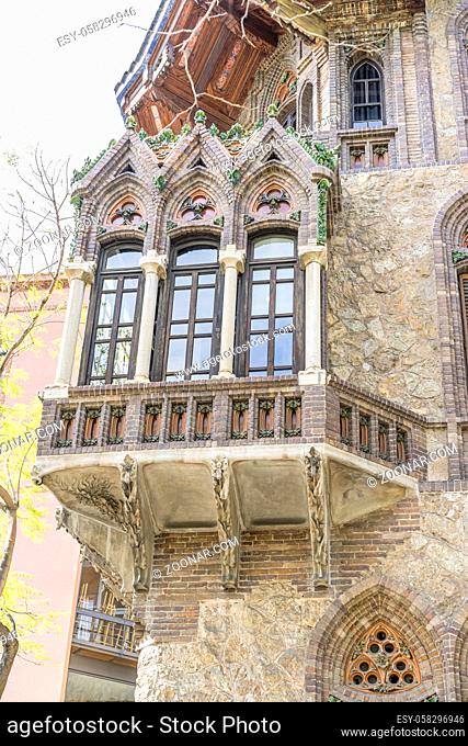 Neo-Gothic house, it looks like an enchanted mansion, Facades and traditional architecture in the old town of Barcelona, Spain