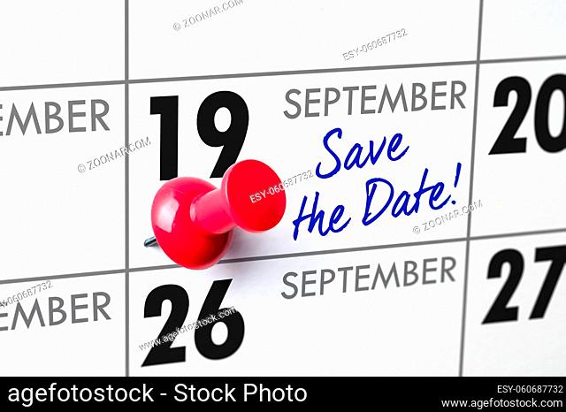 Wall calendar with a red pin - September 19
