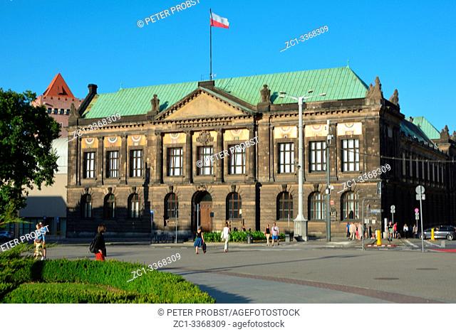 National museum with polish flag in the center of Poznan - Poland