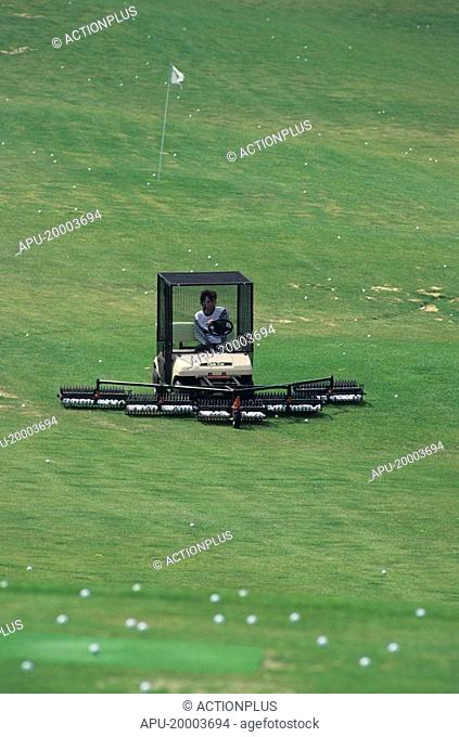 Mechanised golf ball collector on the practice tee