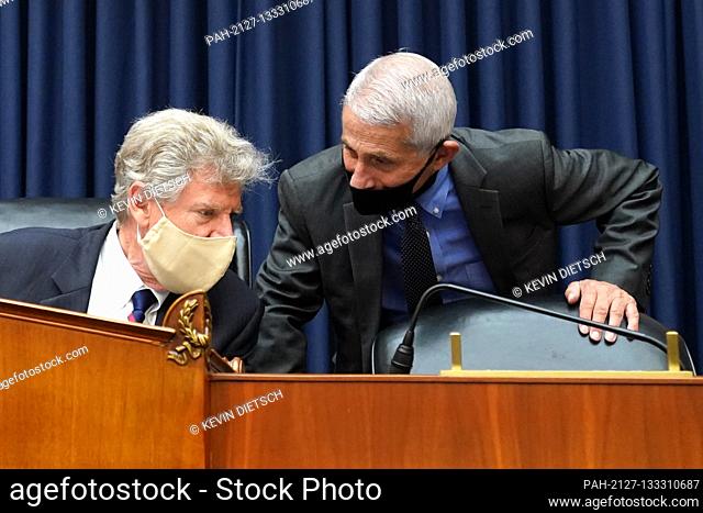 Chairman United States Representative Frank Pallone (Democrat of New Jersey), left, talks to Dr. Anthony Fauci, Director