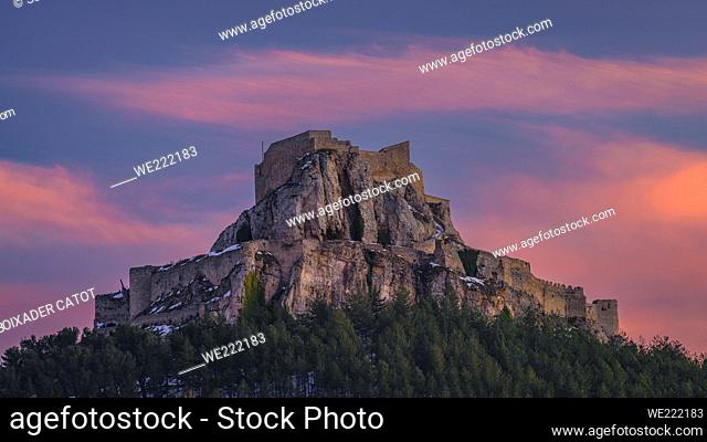 Morella medieval castle in a winter sunset, after a snowfall (Castellón province, Valencian Community, Spain)