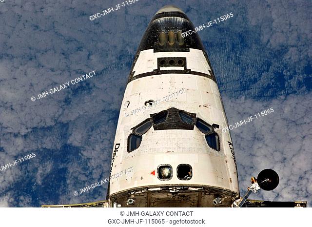 This view of the crew cabin of the space shuttle Discovery was provided by an Expedition 26 crew member during a survey of the approaching STS-133 vehicle prior...