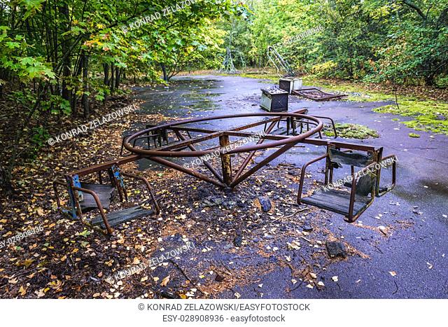 Playground in Pripyat ghost city of Chernobyl Nuclear Power Plant Zone of Alienation around nuclear reactor disaster in Ukraine