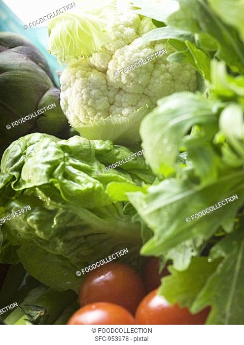 Fresh vegetables in plastic dish close-up