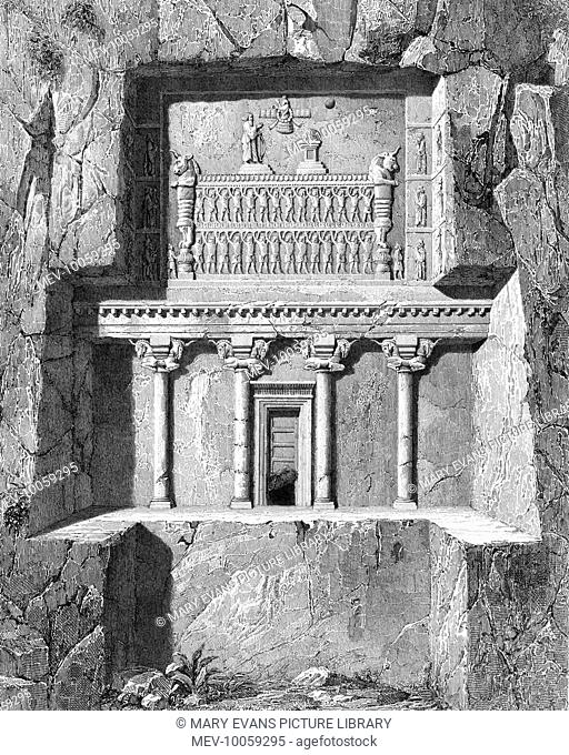 The Tomb of Xerxes, north of Persepolis. The King is shown worshipping in front of a fire altar before the God Ahuramazda, supported by 30 peoples of the empire