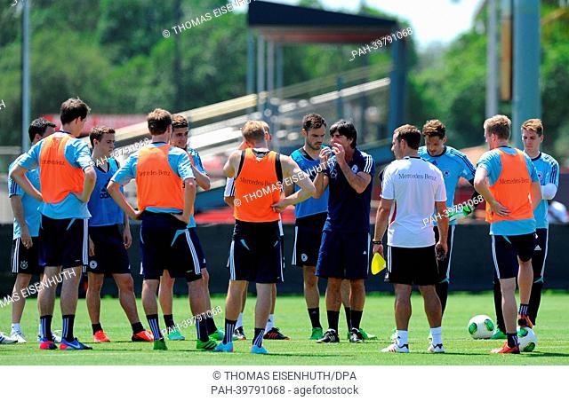 Coach Joachim Löw (C) and the German national team are pictured during the training of the German national team on the grounds of the Barry University in Miami