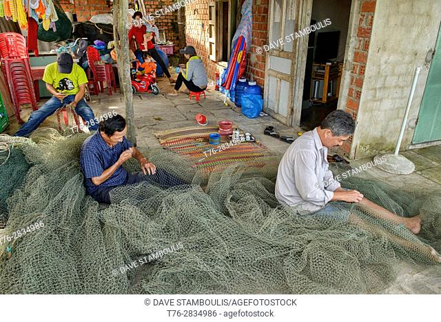Mending fishing nets, Hoi An, Vietnam