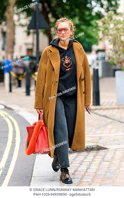 Blogger Nina Suess posing outside the Preen By Thornton Bregazzi runway show during London Fashion Week - Sept 17, 2017 - Photo: Runway Manhattan/Grace Lunn...