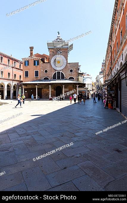 View of the square in front of the ancient Church of San Giamo di Rialto. Venice (Italy), May 31st, 2021