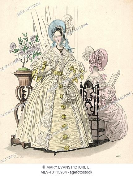 Redingote: embroidered trim, deep falling tucker, skirt en tablier, sleeves en bouffant at the middle of the arm & trimmed with ribbons & roses