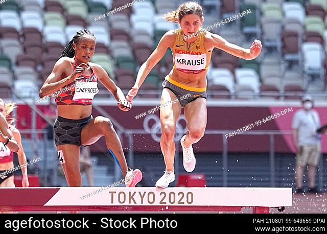 01 August 2021, Japan, Tokio: Athletics: Olympics, 3000 m steeplechase, women, heats at the Olympic Stadium. Gesa Felicitas Krause in action next to Beatrice...