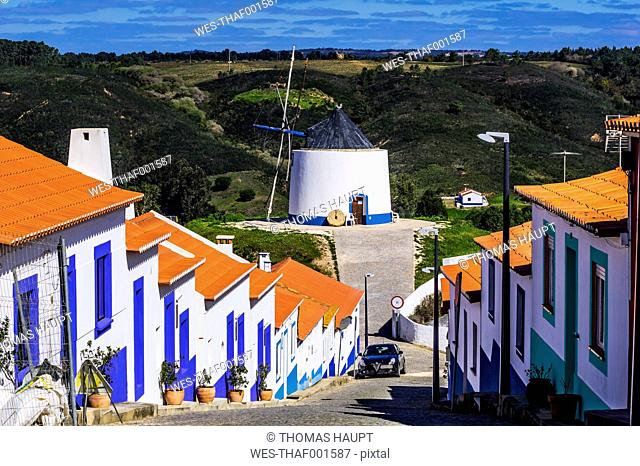 Portugal, Algarve, Odeceixe, alley and wind mill